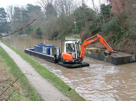 mini excavator pond barg|barge mounted excavators.